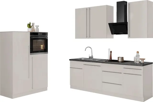Moderne Küche in Weiß mit Arbeitsplatte aus Canvas Grau von wiho Küchen